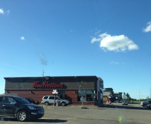 An important Canadian stop: Tim Hortons (which apparently used to have an apostrophe but no longer does, quite likely just to upset those of us who like proper use of apostrophes). Thanks to the Internet, I now know that Tim Horton (the hockey player who started the franchise) was killed in a high speed chase as he drove from Toronto to Buffalo. Also? There was a Tim Hortons on a Canadian military base in Kandahar, Afghanistan. For the record, there is not a Tim Hortons in Kandahar, Saskatchewan.