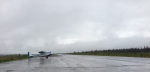 There is a mostly two-lane highway between Anchorage and Fairbanks. This? This is a plane that had landed on that road presumably because of the weather. However, as this is Alaska, I am not ruling out "because the pilot felt like it" as the reason it landed on the road.