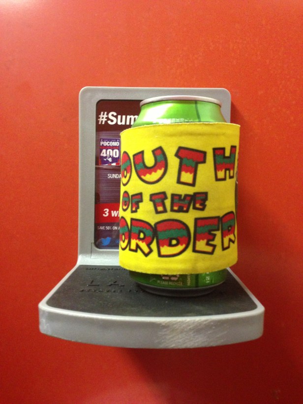 This is a cup holder in a bathroom, holding a beer I legally brought into a sporting venue. And people wonder why I enjoy NASCAR. (Also? More sports venues need to have bathroom cup holders).