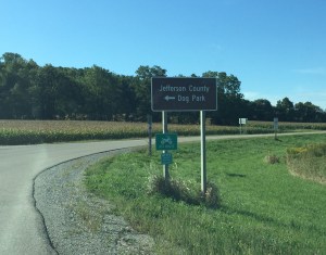 Helpful signs pointing the way to the dog park (watch out for snowmobiles...in about three weeks. WIsconsin!).
